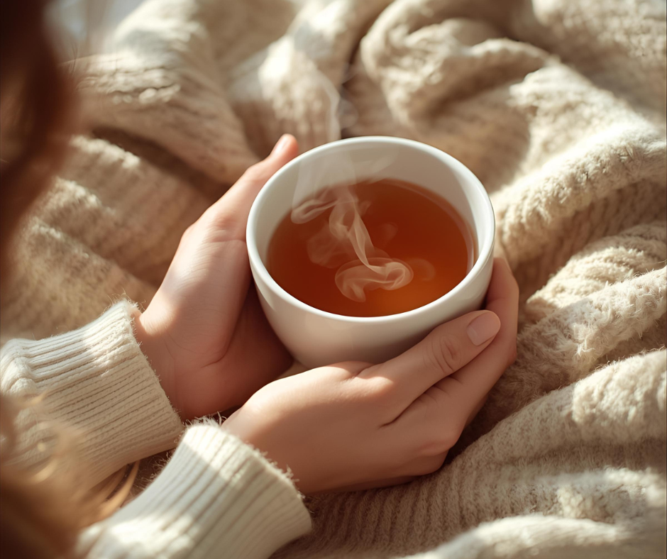 slow morning routine cozy hands holding warm tea